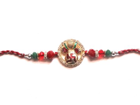 Swastik Rakhi with kalash in studded design For Sale