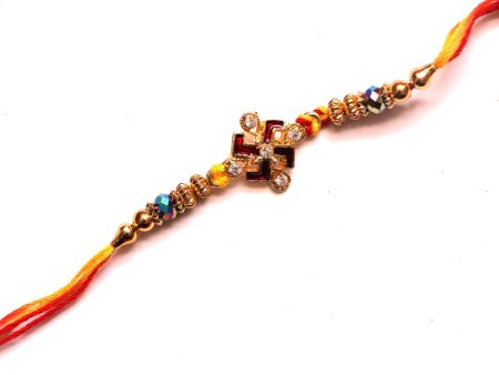 Red Swastik Rakhi with gold beads Online Sale